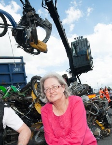 Cllr Sue Derbyshire oversees crushing of 30 illegal bikes